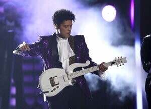 Bruno Mars performs in the Prince tribute at the 59th Grammys in 2017