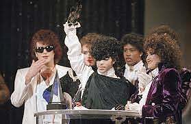 Prince & The Revolution accepting one of four American Music Awards in 1985