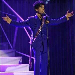 Prince performs "Purple Rain" at the 46th Grammys in 2004