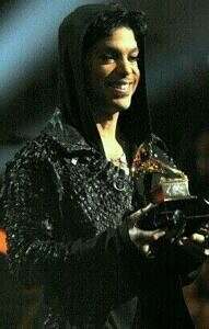Prince presents "Record of the Year" at the 55th Grammys in 2013