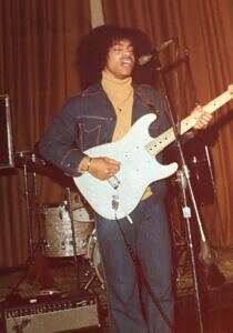 Prince performing onstage as a teenager