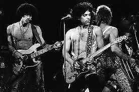 Andre Cymone, Prince, and Dez Dickerson onstage in 1980