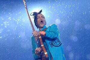 Prince on guitar in the pouring rain, Super Bowl 41, 2007