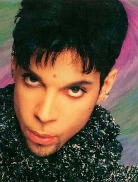 Prince looking intently into the camera