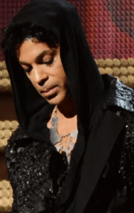 Prince announces the winner for "Record of the Year" at the 55th Grammys in 2013