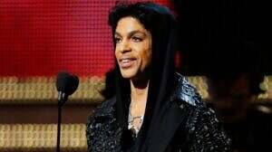 Prince presents "Record of the Year" at the 55th Grammys in 2013