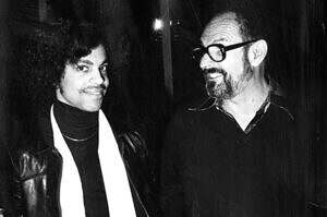 Prince and Chairman of Warner Brothers Mo Ostin, at Prince's 1977 contract signing