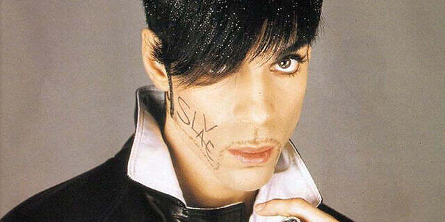Prince with SLAVE on his face