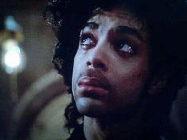 Prince looking to God with tears in his eyes, "Purple Rain" 1984