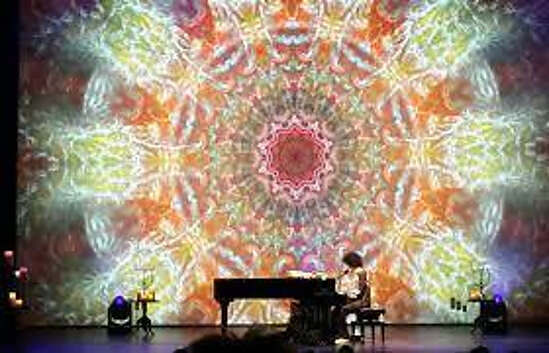 Prince onstage 2016 "Piano & A Microphone" Tour