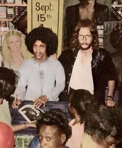 Prince and his manager Owen Husney at a promo event for the "For You" album